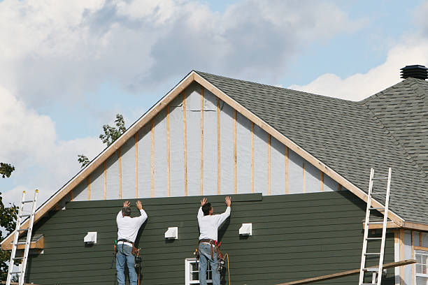 Professional Siding Replacement technician working in Breezewood, PA